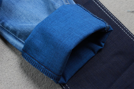 अच्छा दाम गुआंग्डोंग चीन के कारखाने से उच्च गुणवत्ता वाले ब्रांड जींस के लिए उच्च खिंचाव के लिए महिलाओं के जींस के लिए 9-10 औंस Tencel डेनिम कपड़े ऑनलाइन