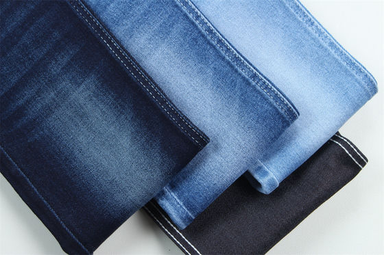 अच्छा दाम 10 Oz सुपर स्ट्रेच डेनिम कपड़े गर्मियों के लिए आदमी जींस कपास पॉलिएस्टर रेयोन स्पैन्डेक्स कच्चे और जंगली ऑनलाइन