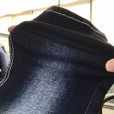 अच्छा दाम 72% कपास 28% पॉलिएस्टर 1.5% स्पैन्डेक्स लाइटवेट स्ट्रेच डेनिम फैब्रिक 9.5 औंस ऑनलाइन